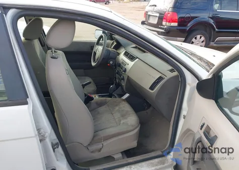 2009 Ford Focus Se z USA, uszkodzony, nr VIN 1FAHP35N09W213065